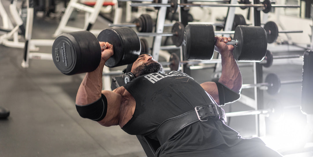 Bodybuilder Fouad Abiad training chest in the gym