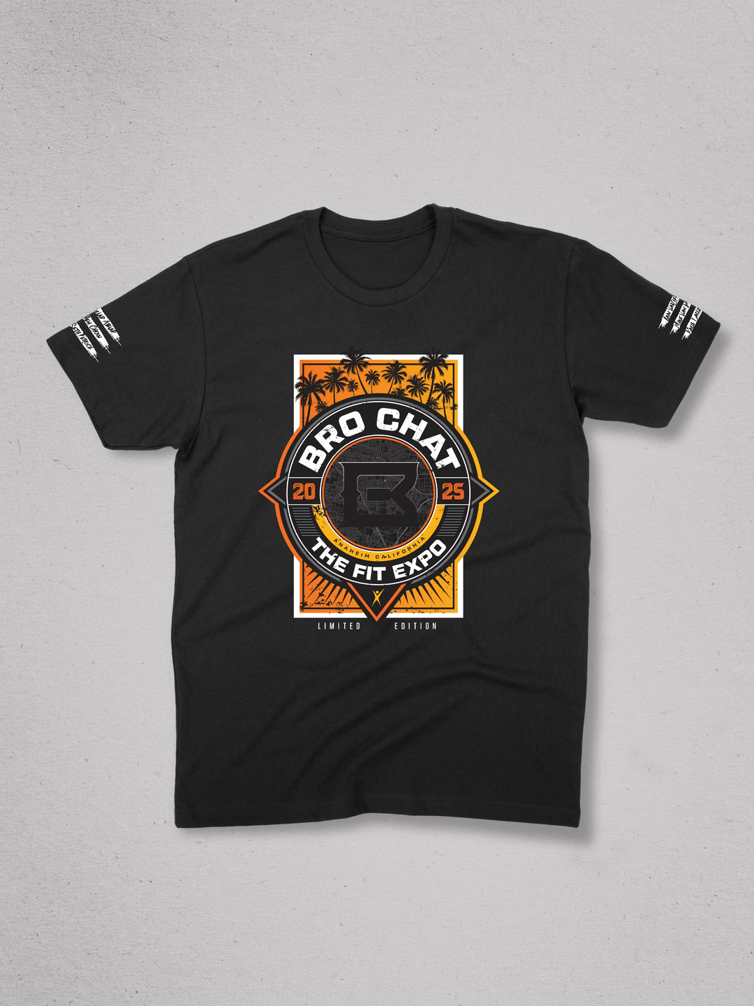 Black t-shirt with orange and white graphic design on a gray background