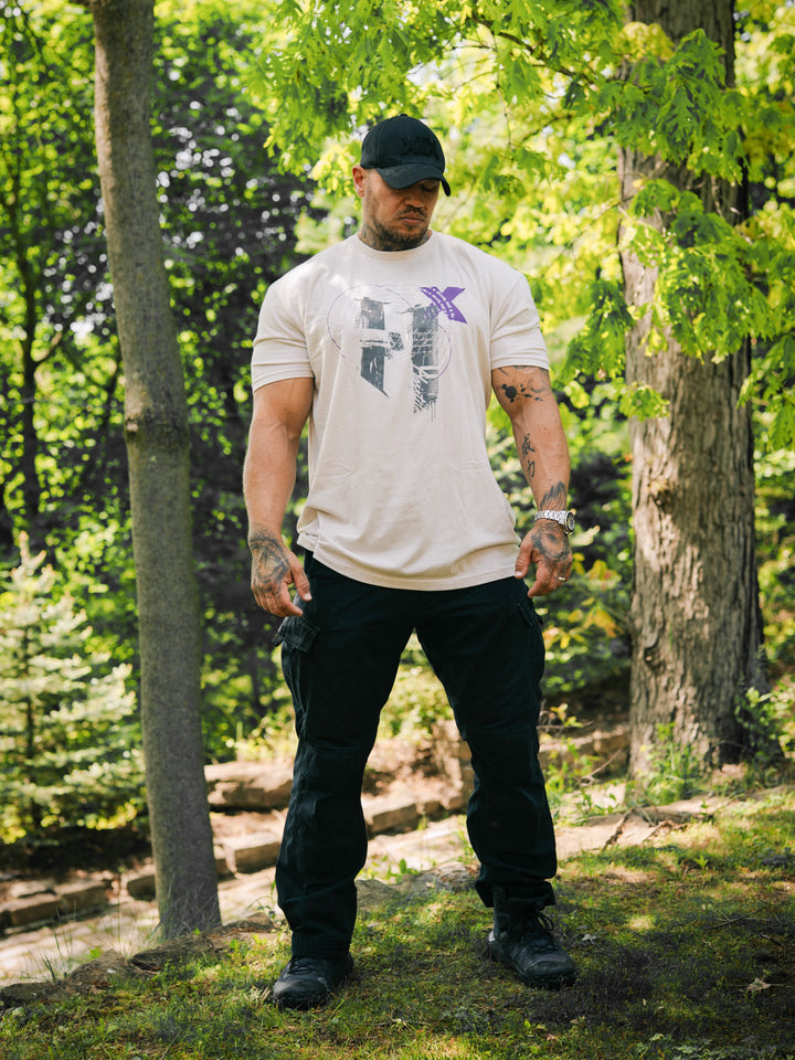Bodybuilder wearing the Halo Workout Tee#color_sand