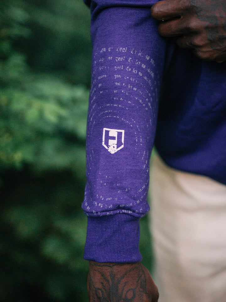 Bodybuilder wearing the Halo Quarter Zip Sweatshirt#color_purple