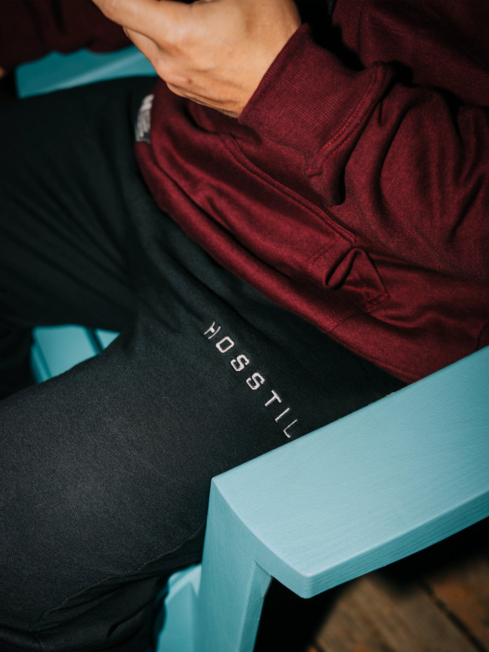 Bodybuilder wearing the Hosstile Straight Leg Jogger#color_black