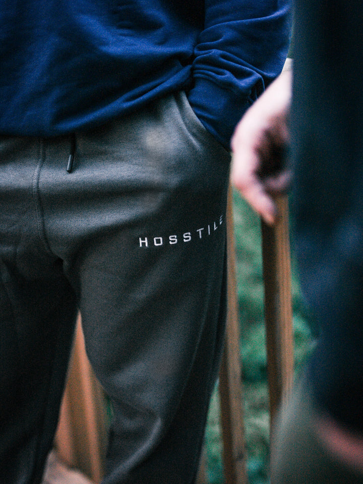 Bodybuilder wearing the Hosstile Straight Leg Jogger#color_grey