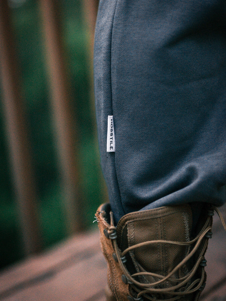 Bodybuilder wearing the Hosstile Straight Leg Jogger#color_grey