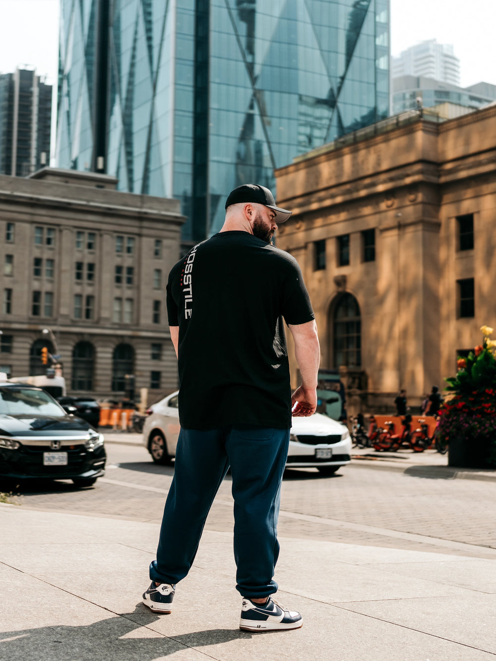 Bodybuilder wearing OG Sacrifice Classic Workout T-Shirt#color_black