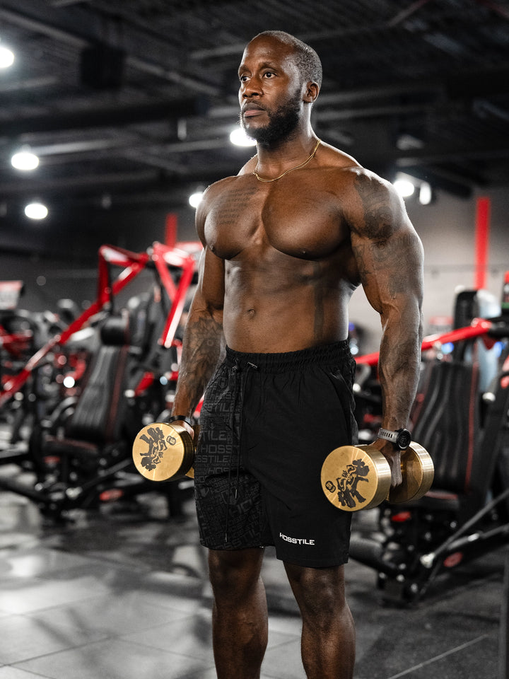 Bodybuilder Wearing Phantom Training Shorts#color_black