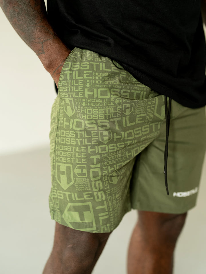 Bodybuilder Wearing Phantom Training Shorts#color_dark-olive