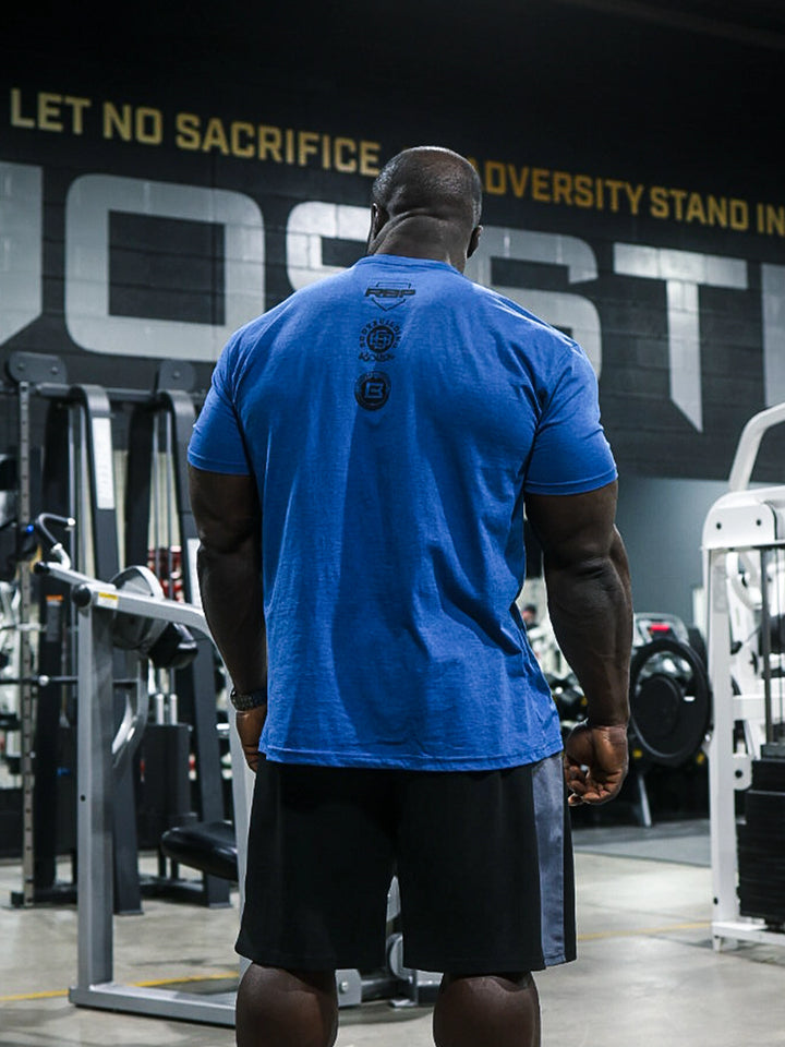 Real Classic Workout Tee Model Bodybuilder Samson Dauda#color_heather-cool-blue