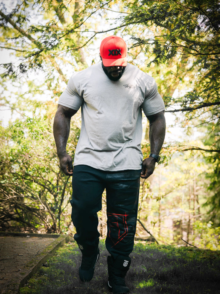 Bodybuilder wearing the Retro Select Workout T-shirt#color_heather-grey