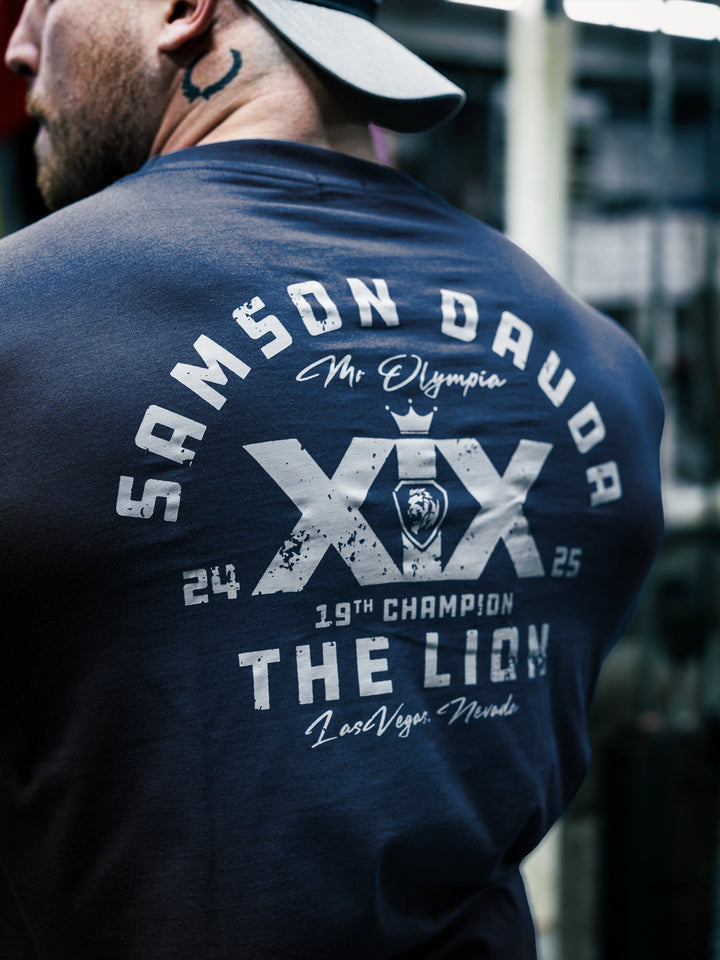 Bodybuilder Martin Fitzwater wearing the Samson Dauda Olympia Edition Vintage T-Shirts#color_pacific-blue