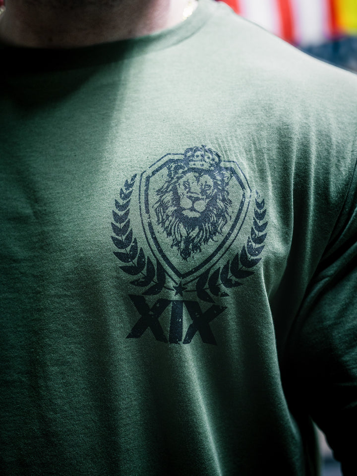 Bodybuilder Martin Fitzwater wearing the Samson Dauda Olympia Edition Vintage T-Shirts#color_light-olive
