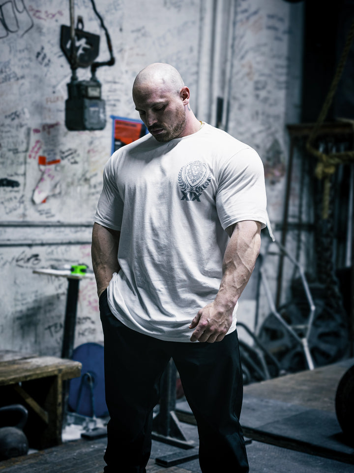 Bodybuilder Martin Fitzwater wearing the Samson Dauda Olympia Edition Vintage T-Shirts#color_off-white