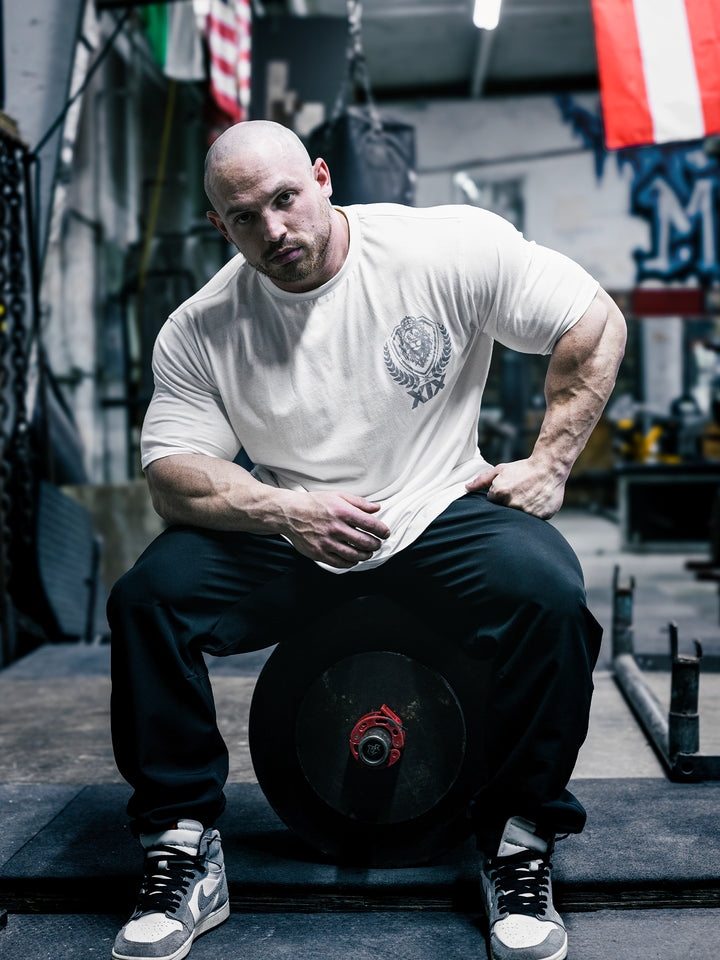 Bodybuilder Martin Fitzwater wearing the Samson Dauda Olympia Edition Vintage T-Shirts#color_off-white