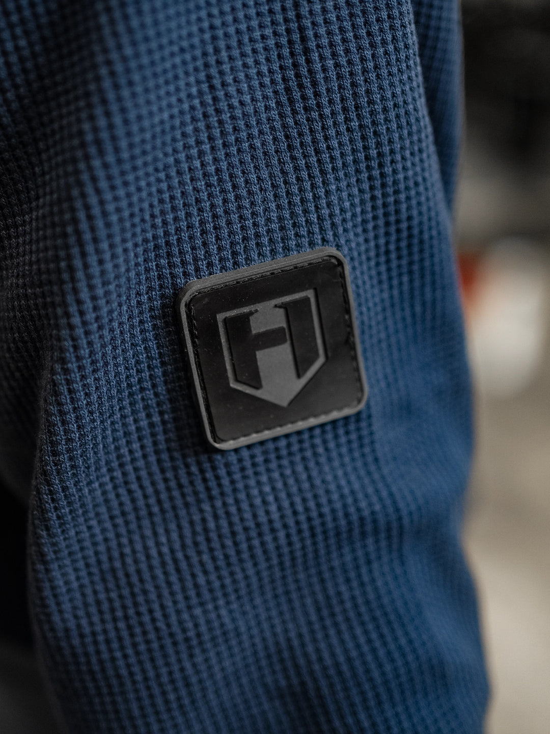 Fitness model wearing Shield Thermal Shirt#color_steel-blue