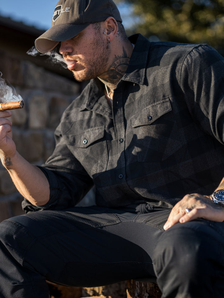 Hosstile Shield Long Sleeve Plaid Flannel Button Down Shirt Model Ben Chow#color_charcoal-black