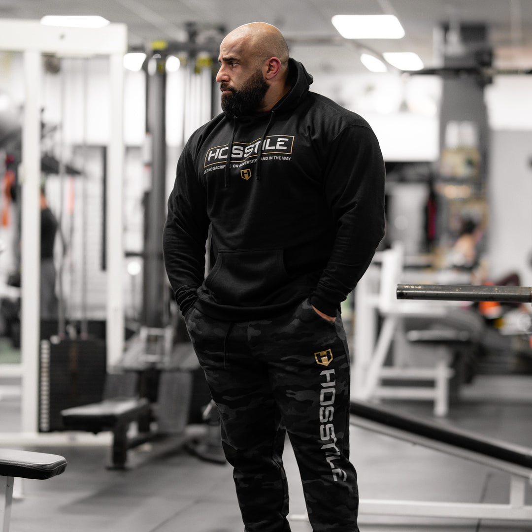 Bodybuilder Fouad Abiad wearing Hosstile Signature Hoodie#color_black