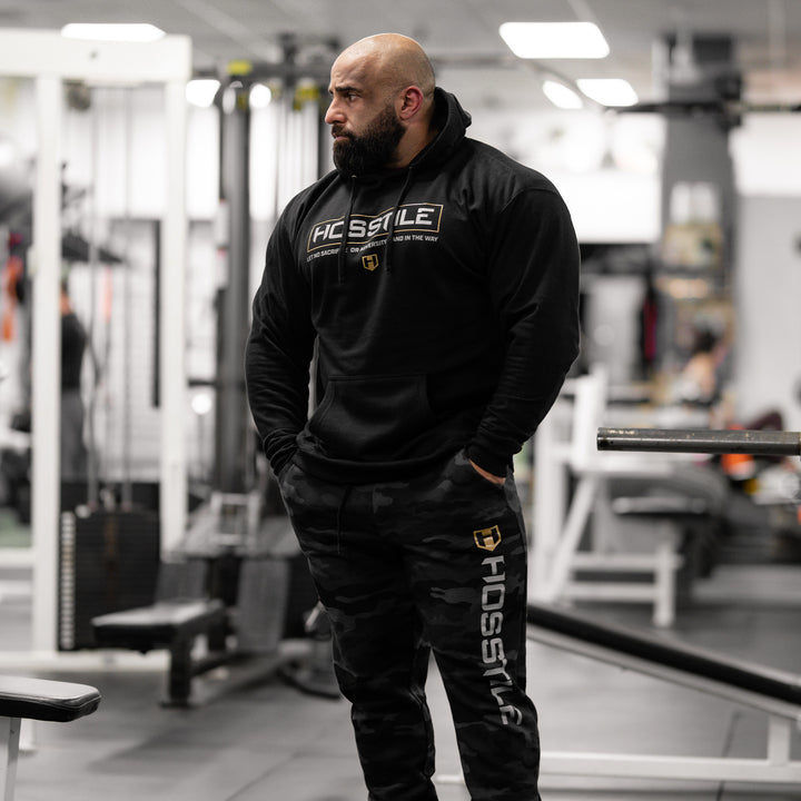 Bodybuilder Fouad Abiad wearing Hosstile Signature Hoodie#color_black