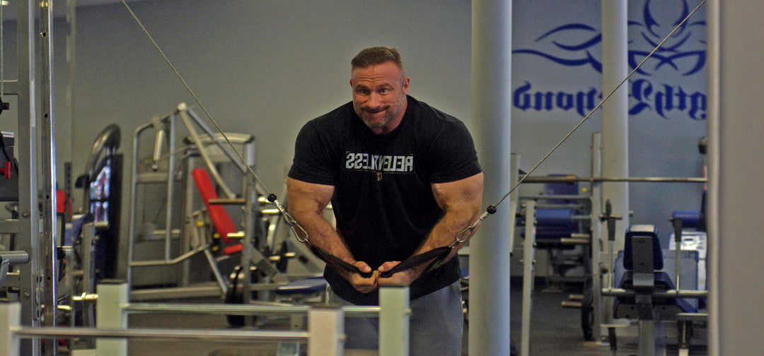 Bodybuilder Justin Harris training chest with cable crossovers