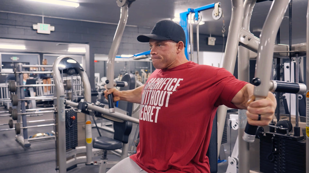 Bodybuilder Justin Shier training chest in the gym