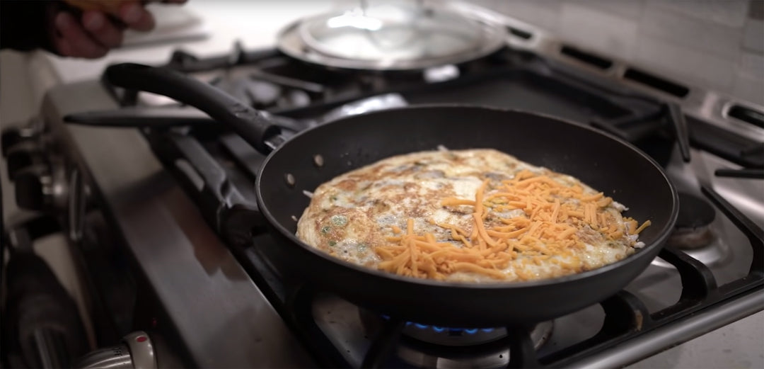 Fouad Abiad Cooking Egg White Omelet with Vegetables and Cheese