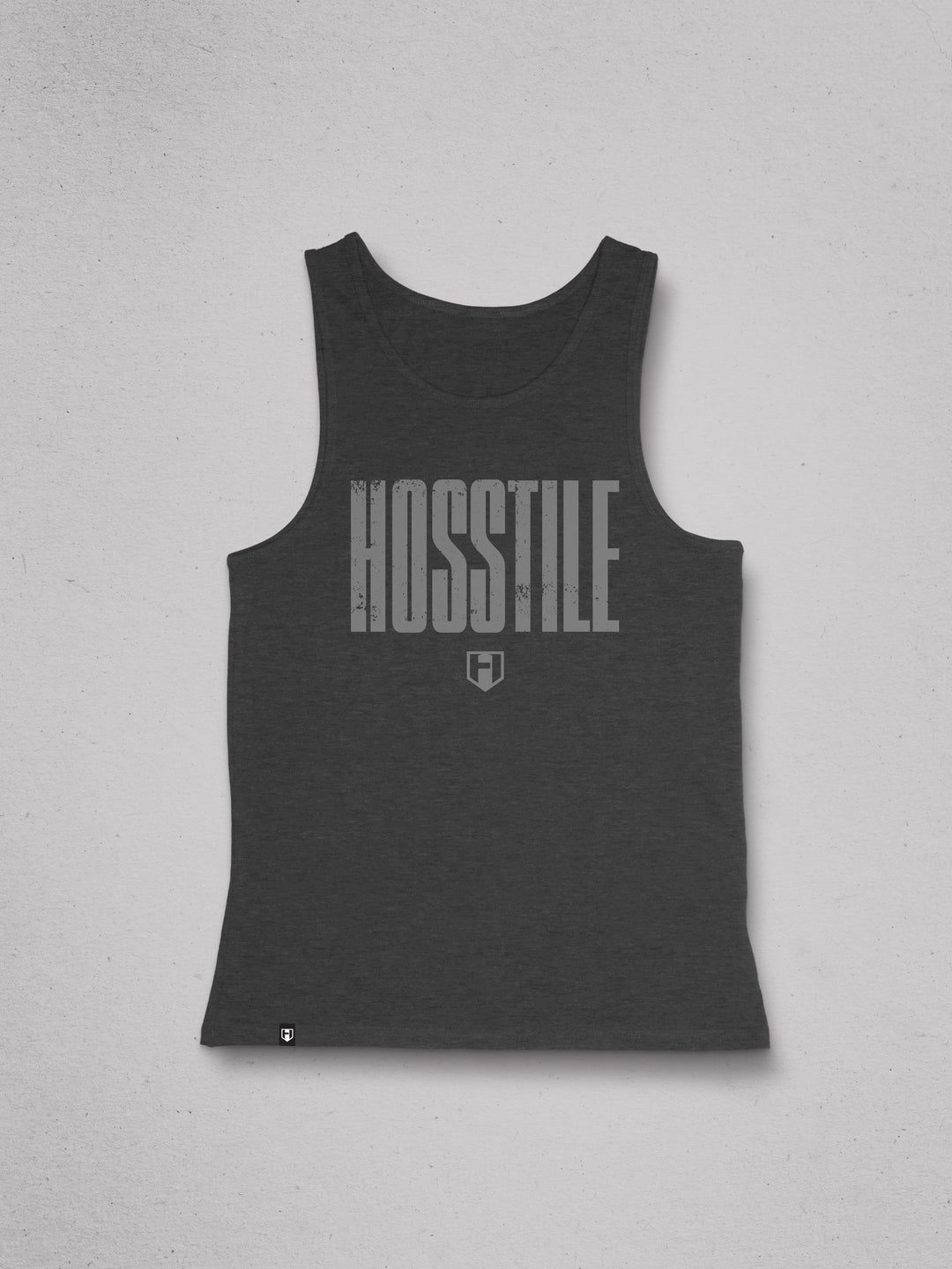Black tank top with 'HOSSTILE' text on a gray background#color_asphalt