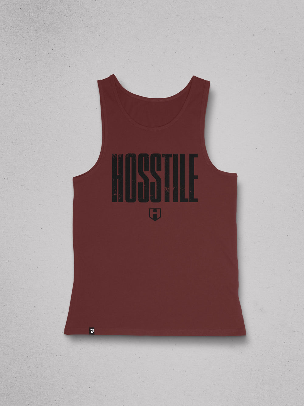 Maroon tank top with 'HOSSTILE' printed on a gray background#color_deep-cherry