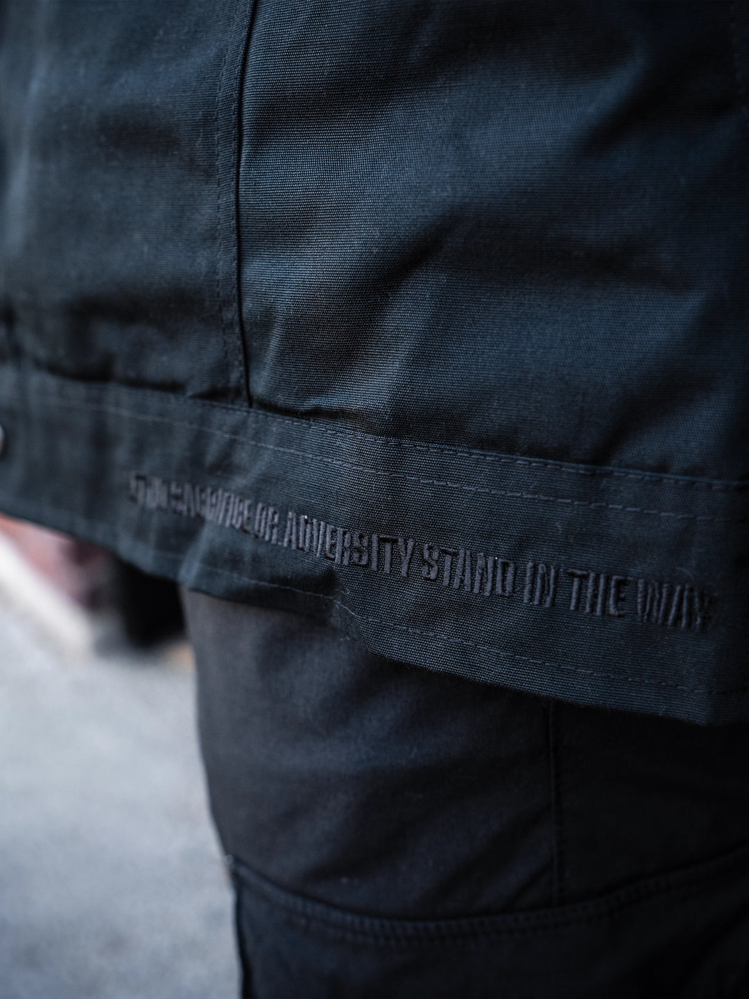 Bodybuilder wearing the Canvas Work Jacket#color_black