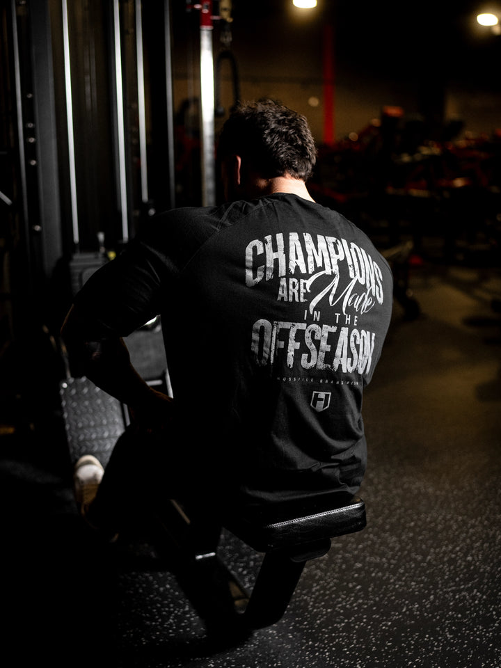 bodybuilder wearing Champion Oversized Tee#color_black-grey