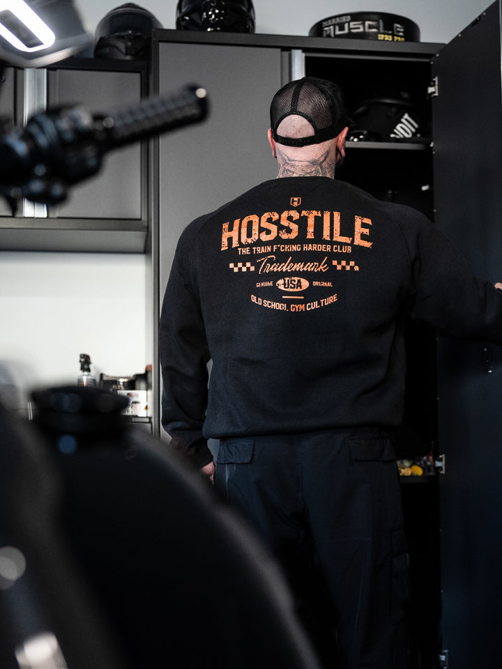 Bodybuilder wearing the Hosstile Club Crew Sweatshirt#color_black