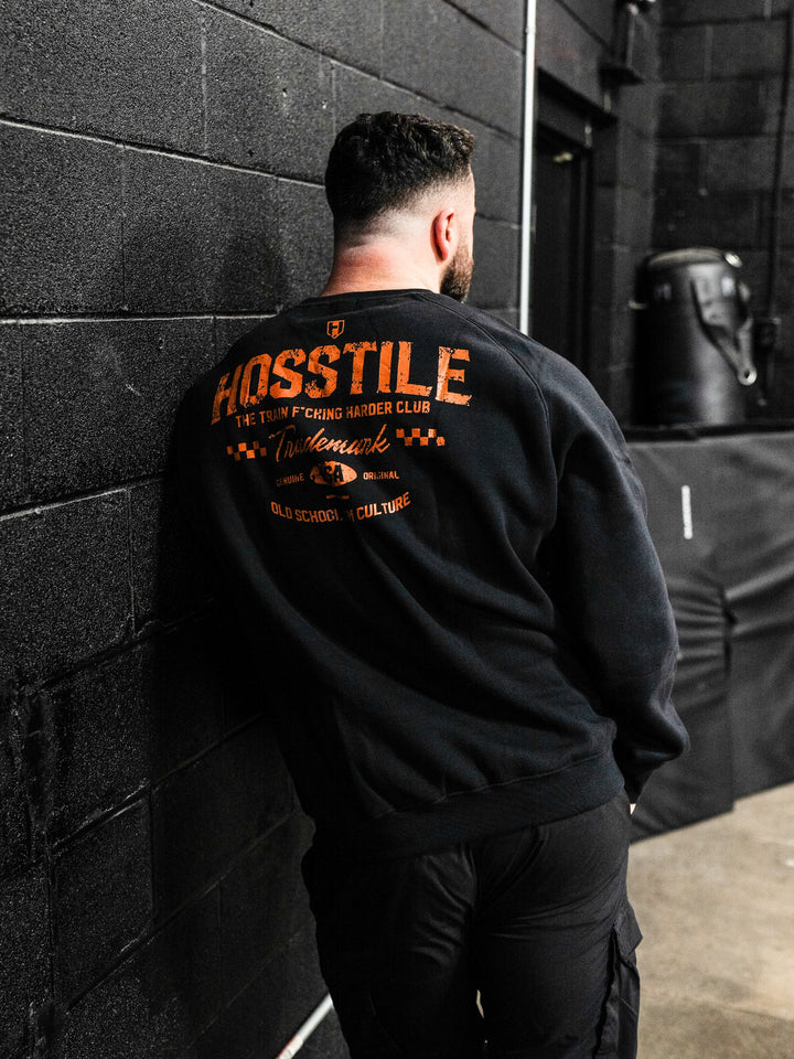Bodybuilder wearing the Hosstile Club Crew Sweatshirt#color_black