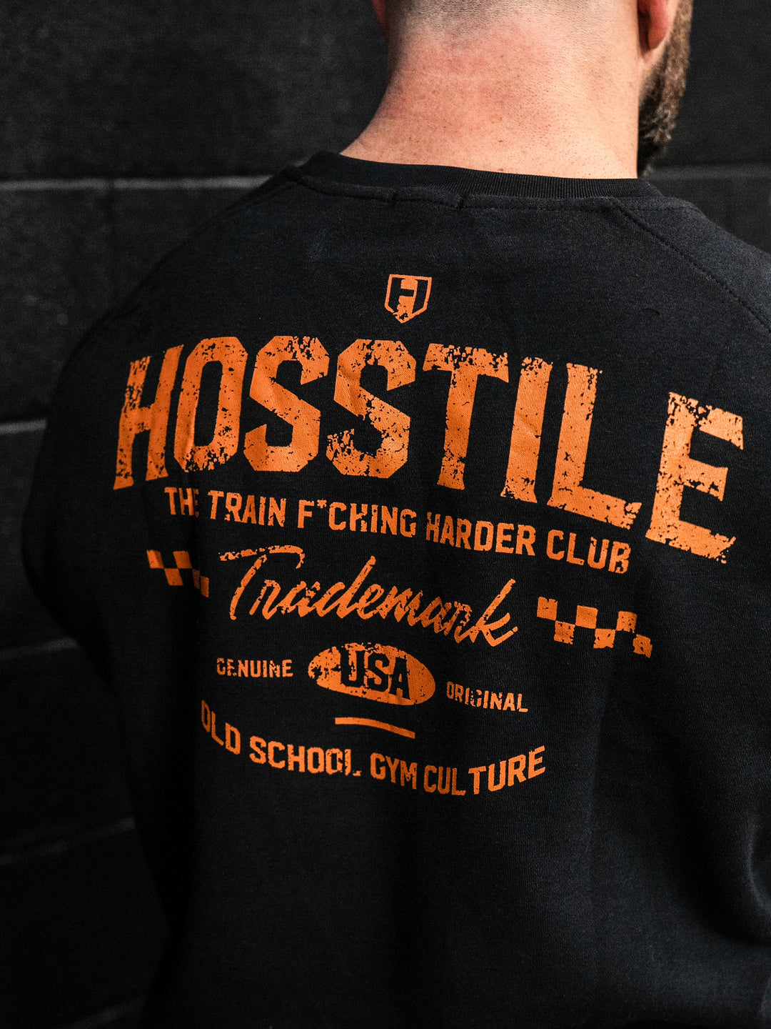Bodybuilder wearing the Hosstile Club Crew Sweatshirt#color_black