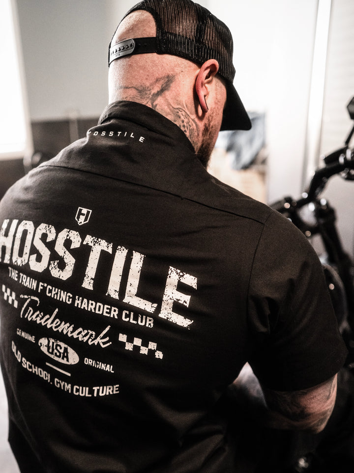 Man wearing the Hosstile Club Work Shirt in Black#color_black