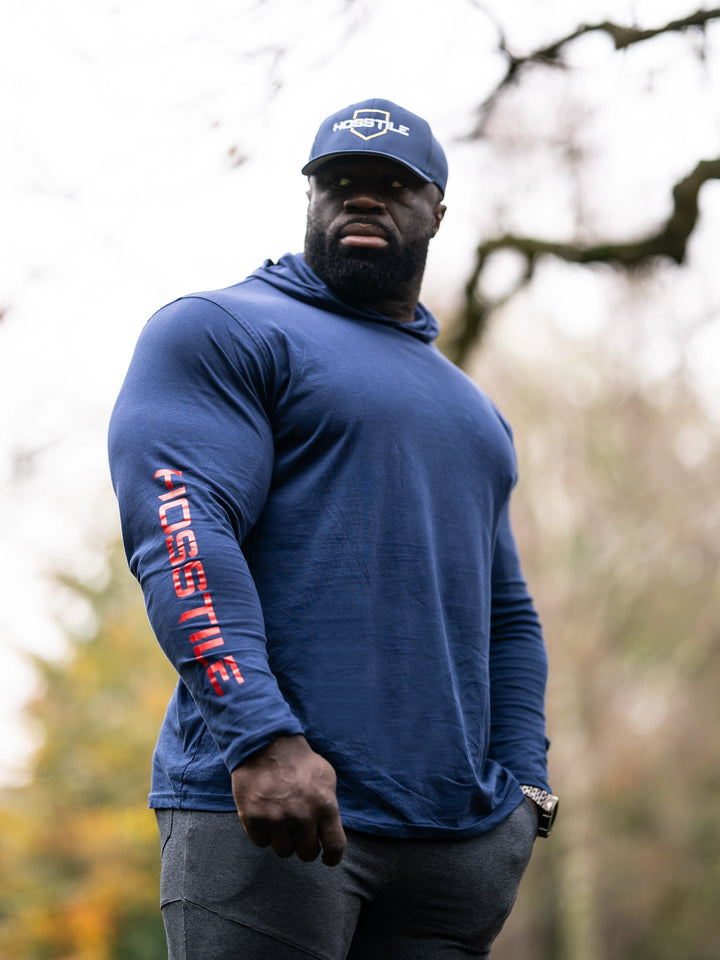 Bodybuilder Samson Dauda wearing the Core Pullover Hoodie#color_navy