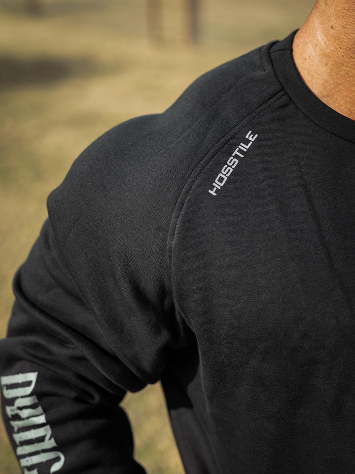 Bodybuilder wearing the Dying Breed Crew Sweatshirt#color_black