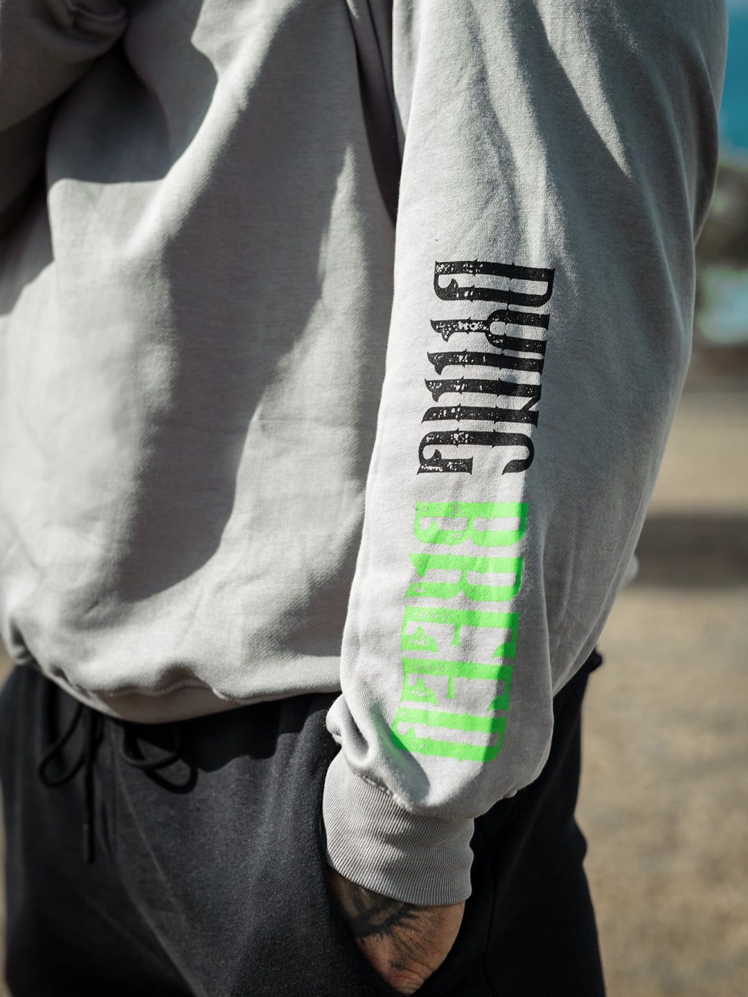 Bodybuilder wearing the Dying Breed Crew Sweatshirt#color_grey