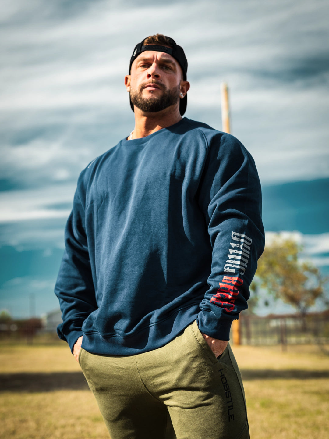 Bodybuilder wearing the Dying Breed Crew Sweatshirt#color_navy