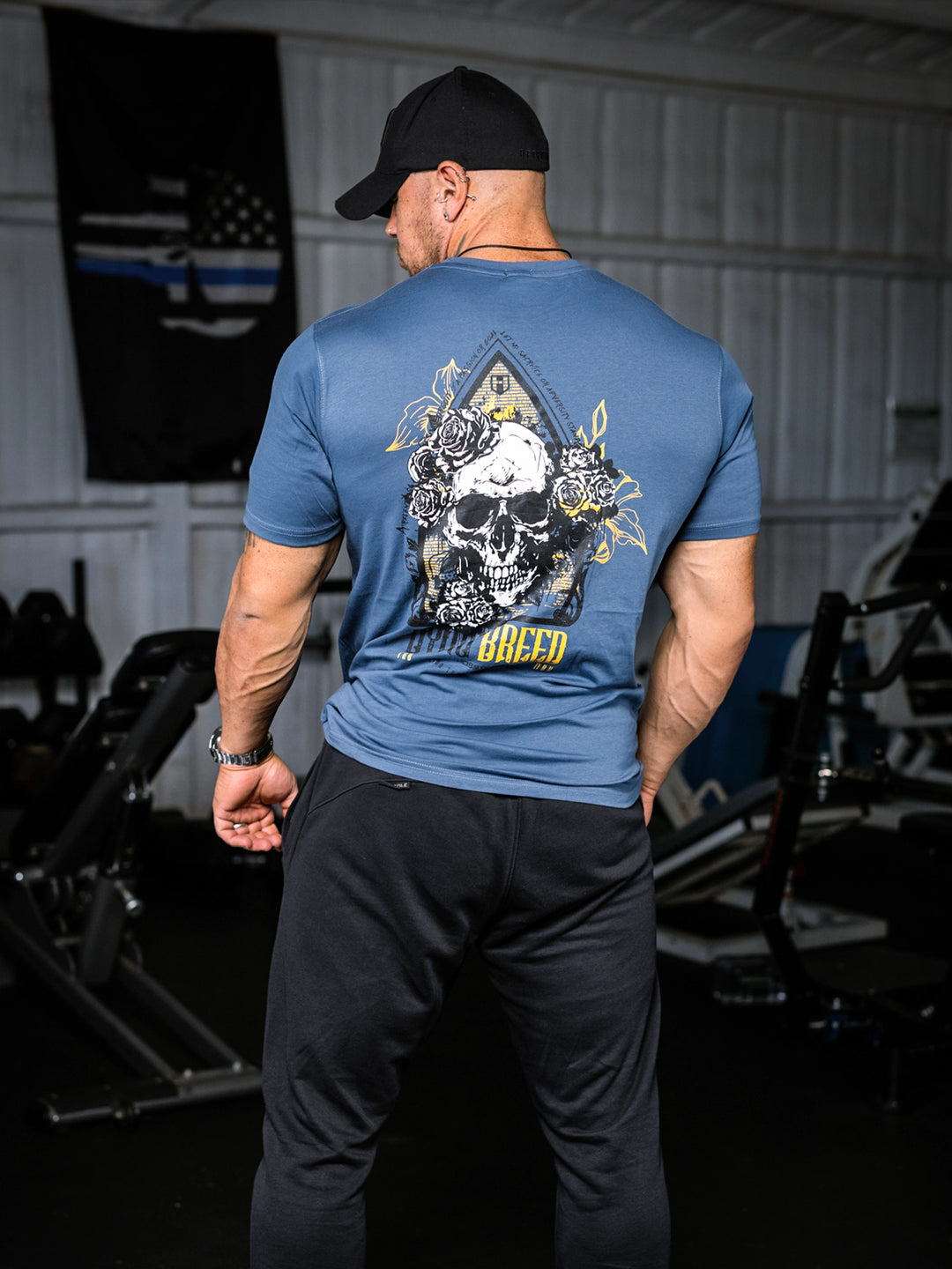 Bodybuilder wearing the Dying Breed Gym T-shirt#color_imperial-blue