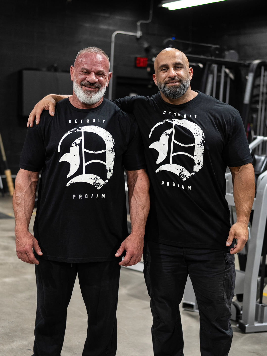 Bodybuilder Fouad Abiad and Paul Lauzon wearing the Detroit Pro Tee