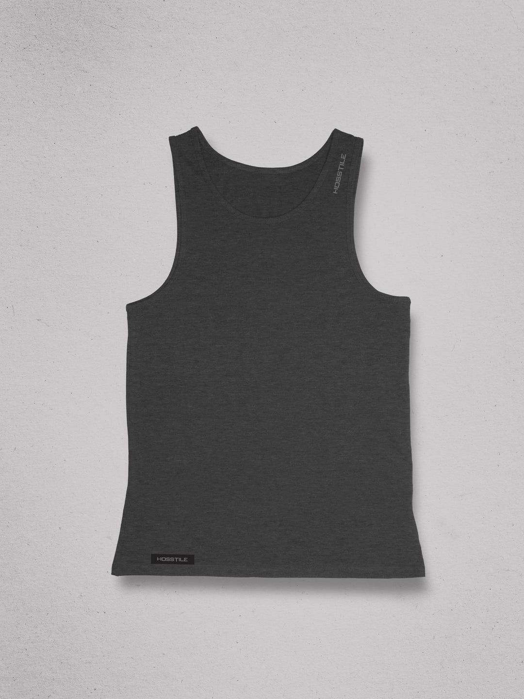 Gray tank top with a label on a gray background#color_asphalt