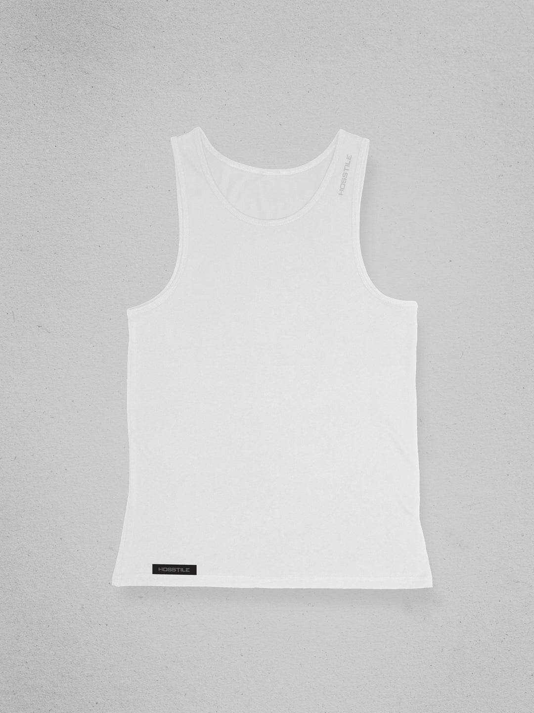 White tank top with a label on a gray background#color_white
