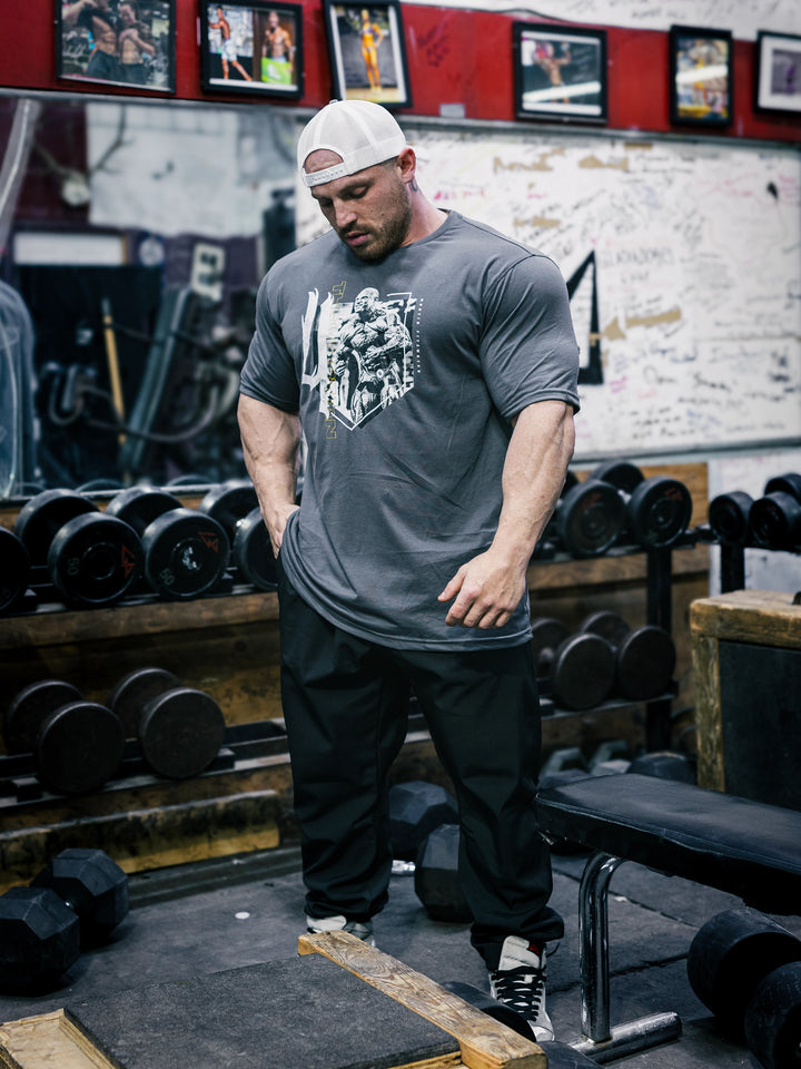 Bodybuilder Martin Fitzwater wearing the Olympia Debut T-Shirt in the Gym