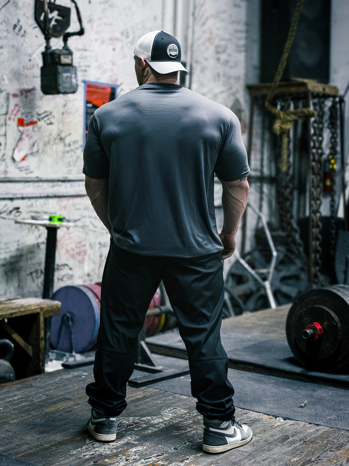 Bodybuilder Martin Fitzwater wearing the Olympia Debut T-Shirt in the Gym