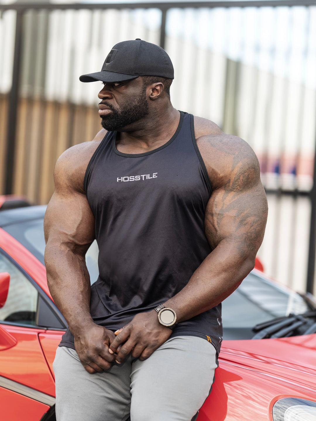 Bodybuilder Samson Dauda wearing the Echo Long Body Tank Top