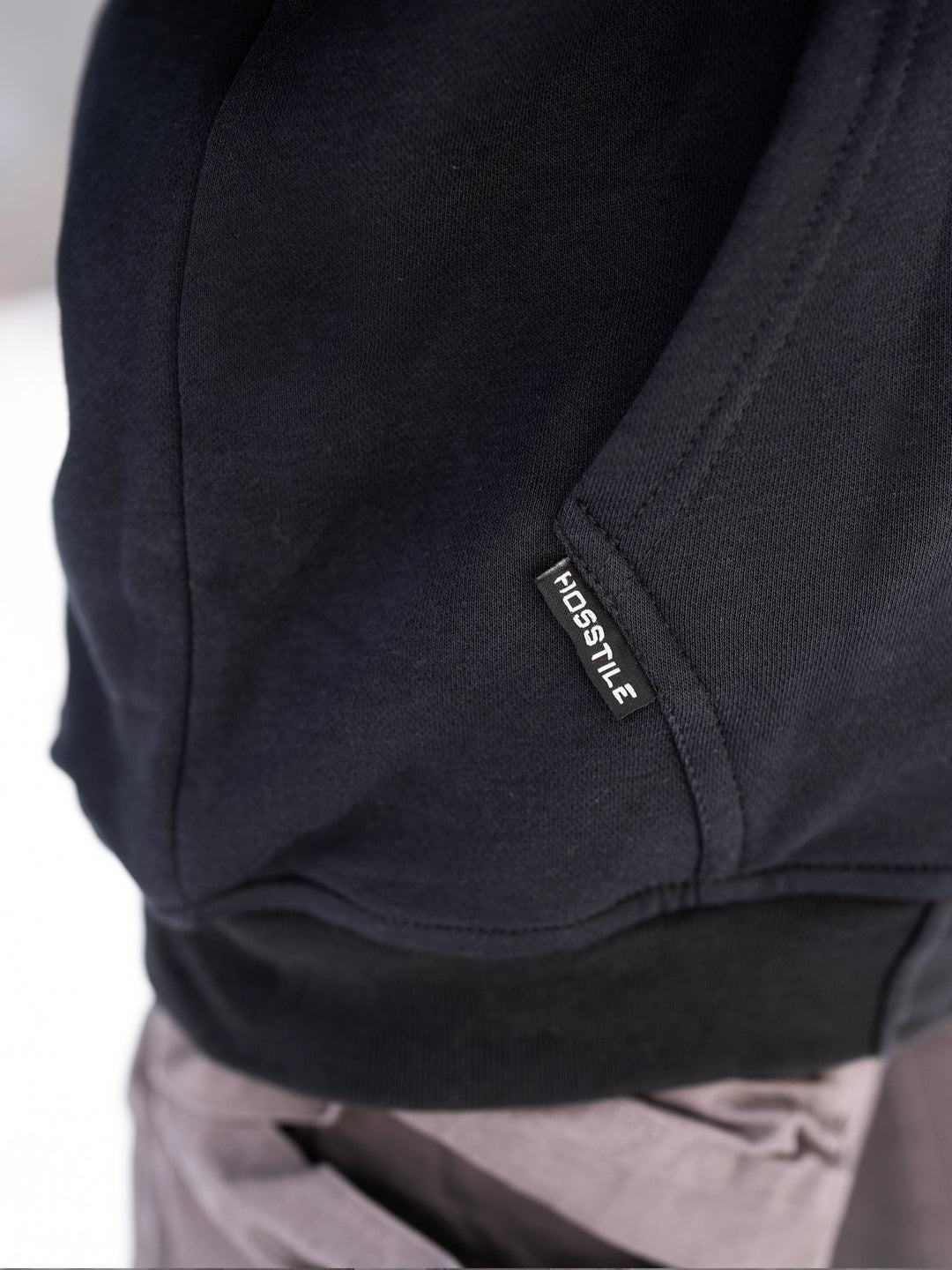 Bodybuilder wearing the Endure Sherpa-Lined Hoodie Outside#color_black