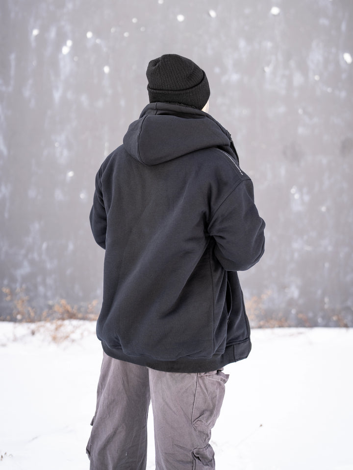 Bodybuilder wearing the Endure Sherpa-Lined Hoodie Outside#color_black