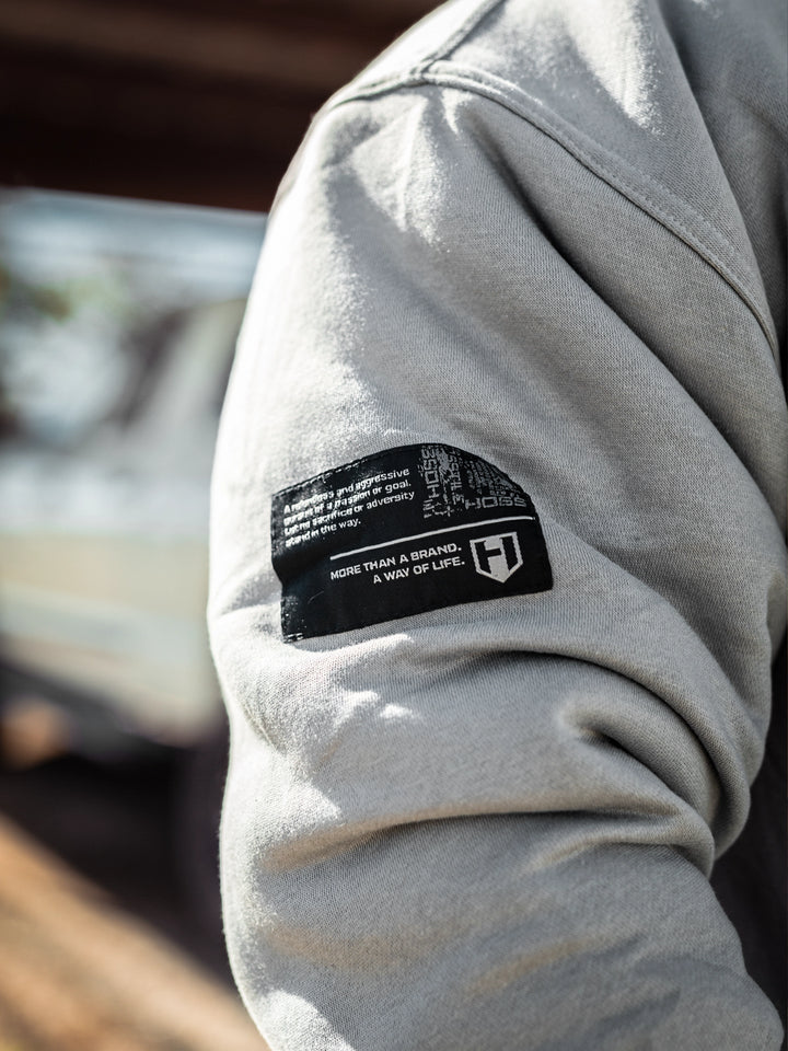 Bodybuilder wearing the Endure 2.0 Sherpa Hoodie#color_grey