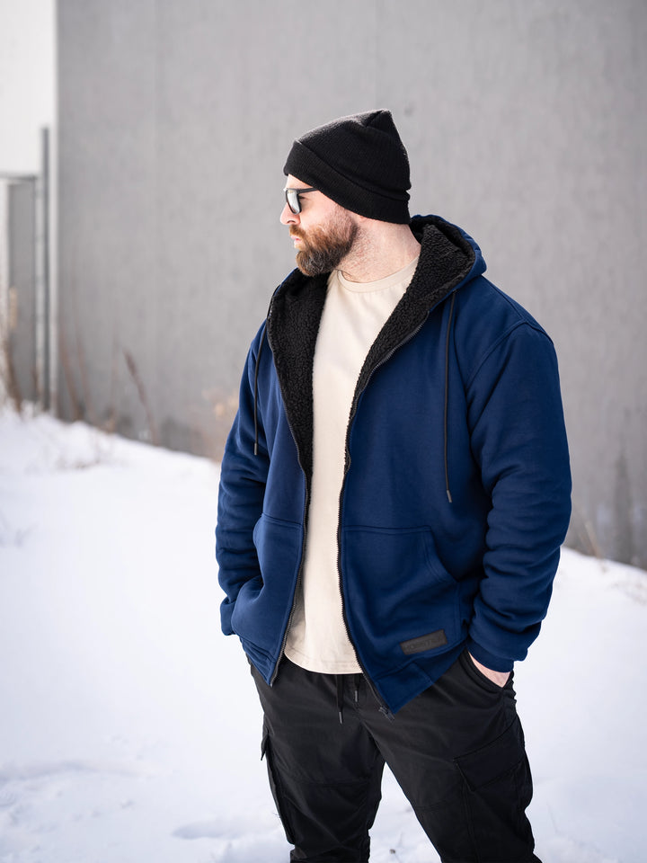 Bodybuilder wearing the Endure Sherpa-Lined Hoodie Outside#color_navy