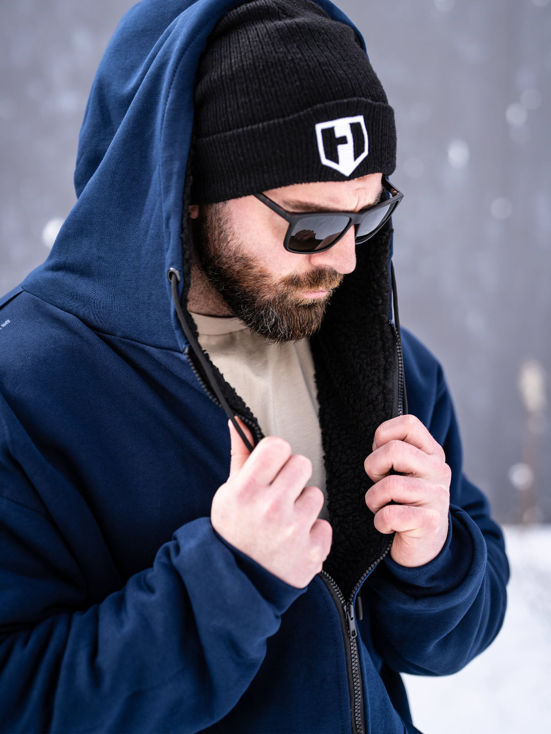 Bodybuilder wearing the Endure Sherpa-Lined Hoodie Outside#color_navy