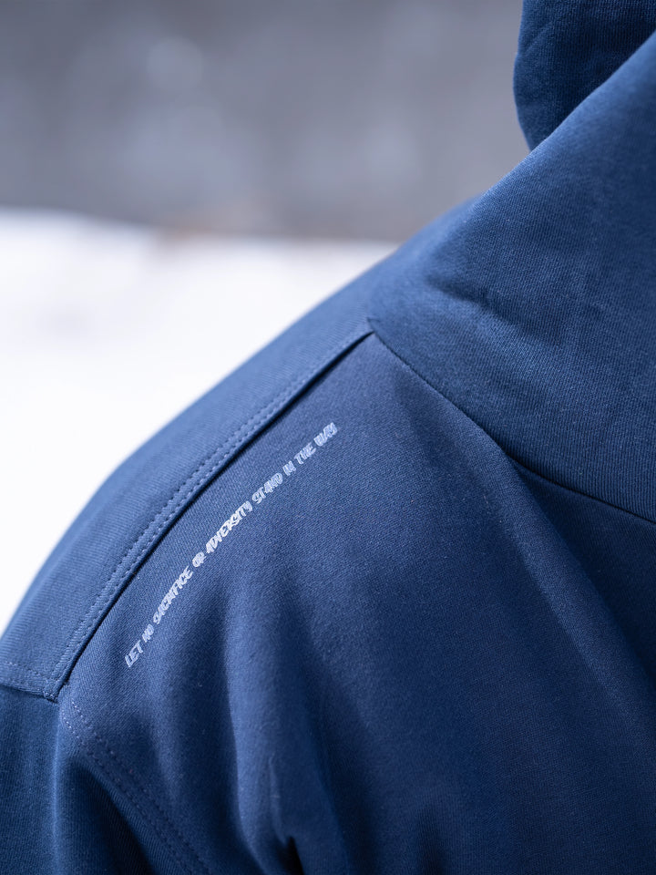 Bodybuilder wearing the Endure Sherpa-Lined Hoodie Outside#color_navy