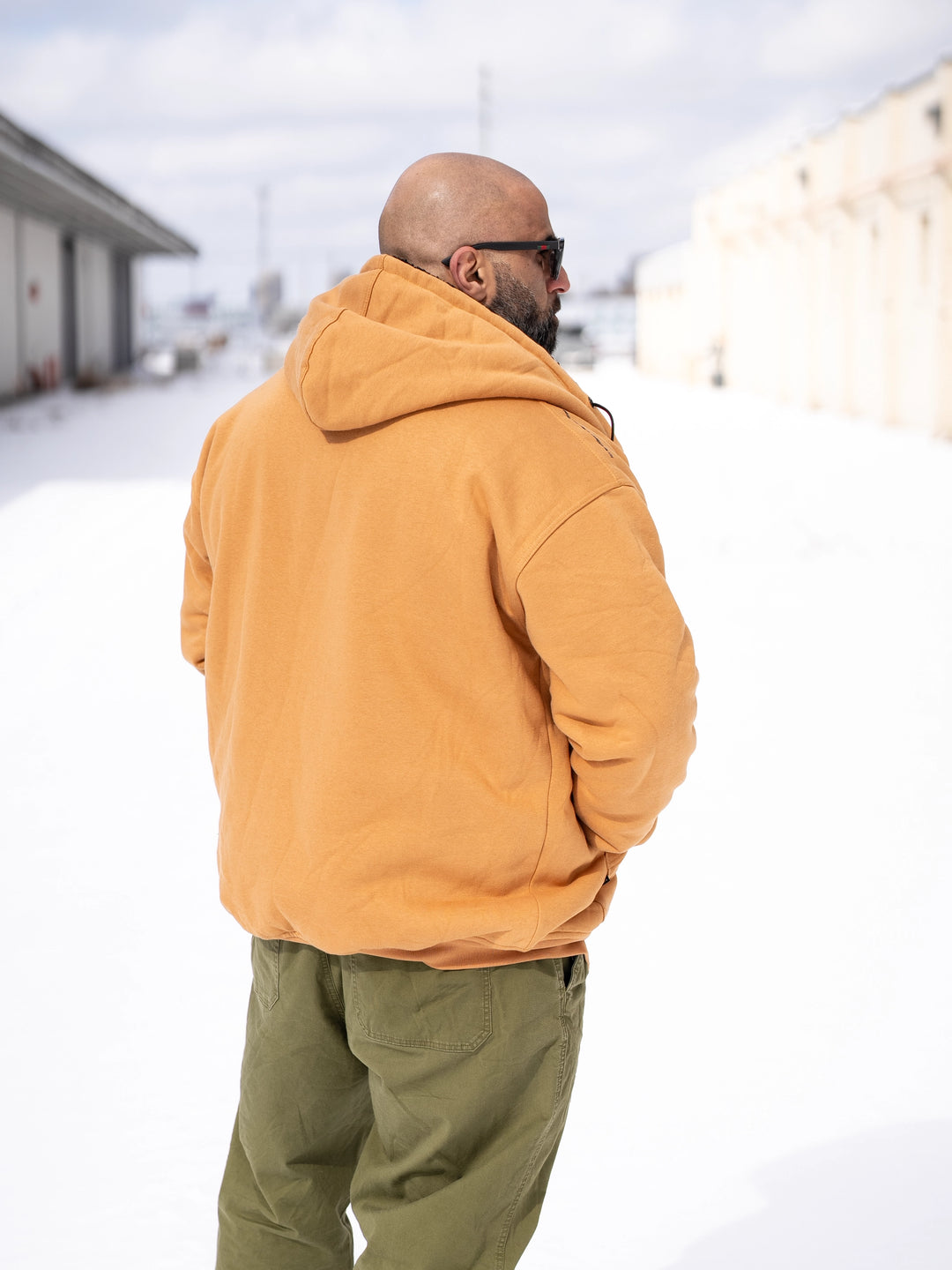 Bodybuilder Fouad Abiad wearing the Endure Sherpa-Lined Hoodie Outside#color_tundra