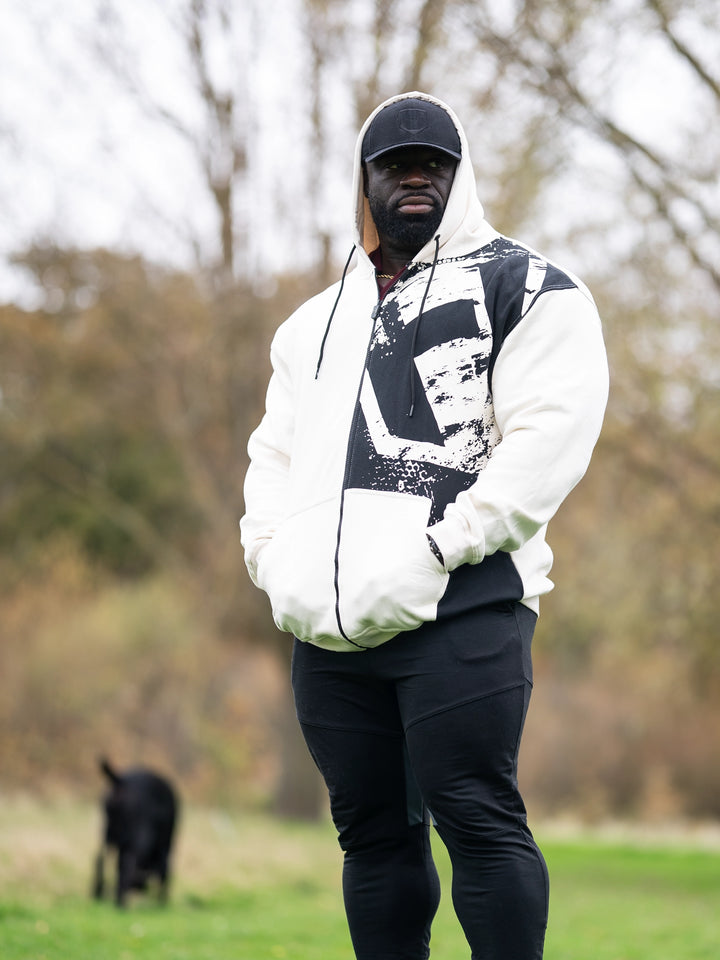 Samson Dauda wearing the Fractured Zip-Up Hoodie#color_off-white